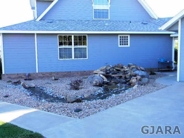 1181-17 17 1/2 Road Fruita, CO 81521 - Photo 14 of 38 a front view of a house
