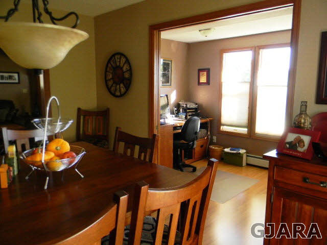 1181-17 17 1/2 Road Fruita, CO 81521 - Photo 21 of 38 a view of a dining room with furniture window and outside view