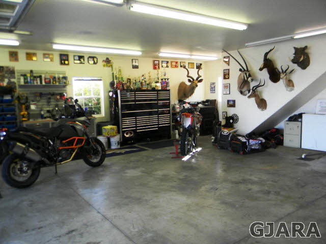 1181-17 17 1/2 Road Fruita, CO 81521 - Photo 5 of 38 a view of a garage with parked cars