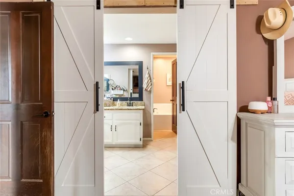 a view of hallway with washer and dryer