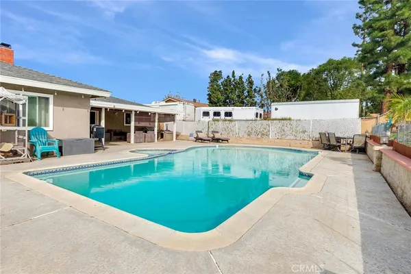 swimming pool view with a outdoor space