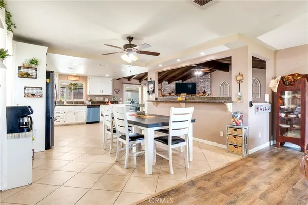 a view of a kitchen and dining room