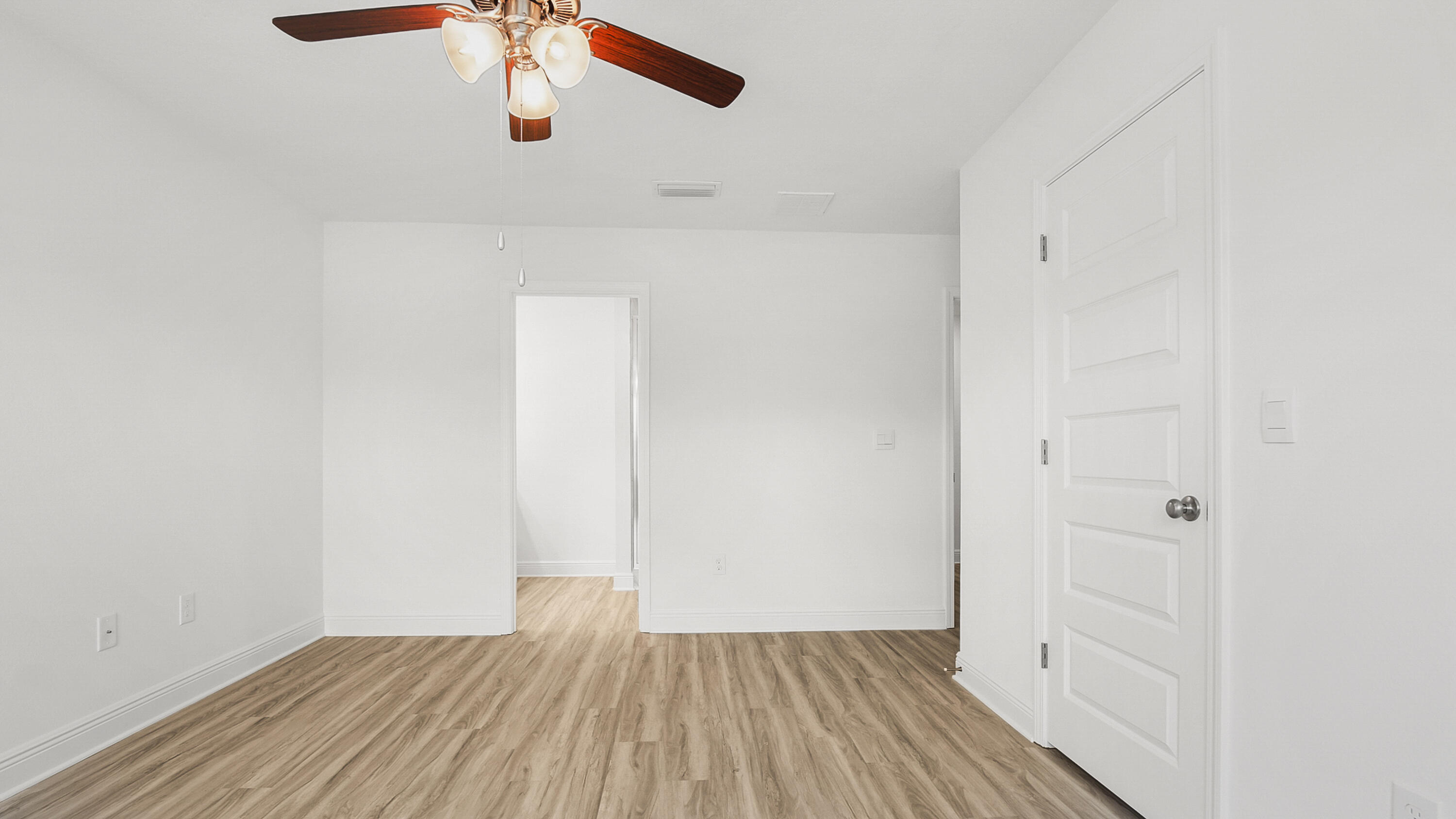 49 Phoenix Street Santa Rosa Beach, FL 32459 - Photo 19 of 34 a view of a room with wooden floor