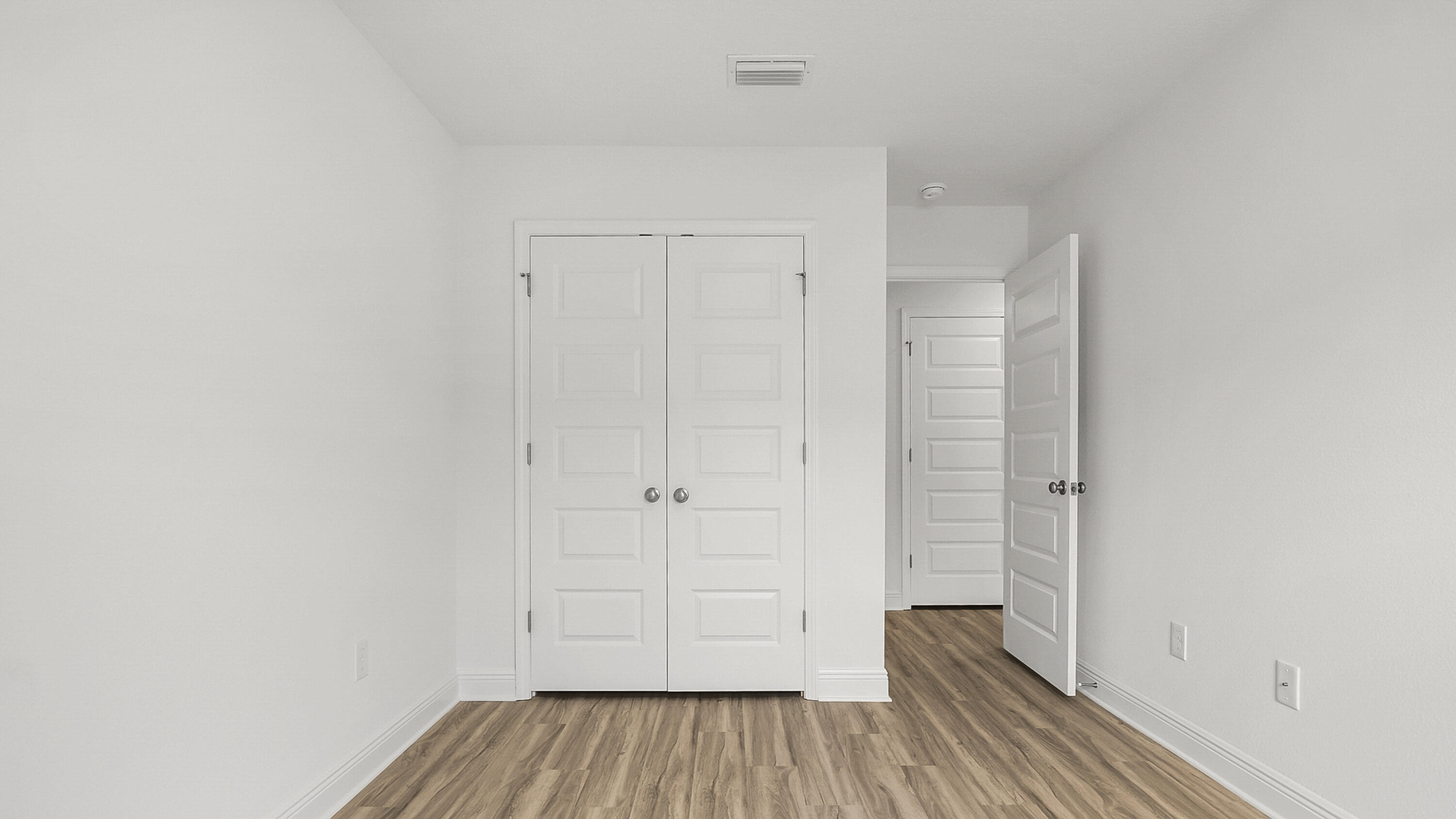 49 Phoenix Street Santa Rosa Beach, FL 32459 - Photo 25 of 34 a view of a room with wooden floor