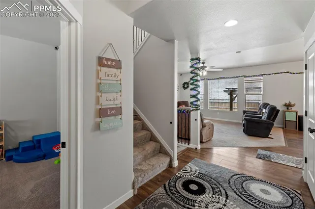 a room with toys and a flat screen tv