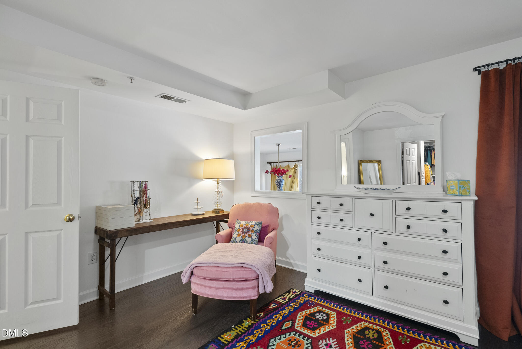 200 South Dawson Street, Unit 111 Raleigh, NC 27601 - Photo 18 of 34 a living room with furniture and a baby crib
