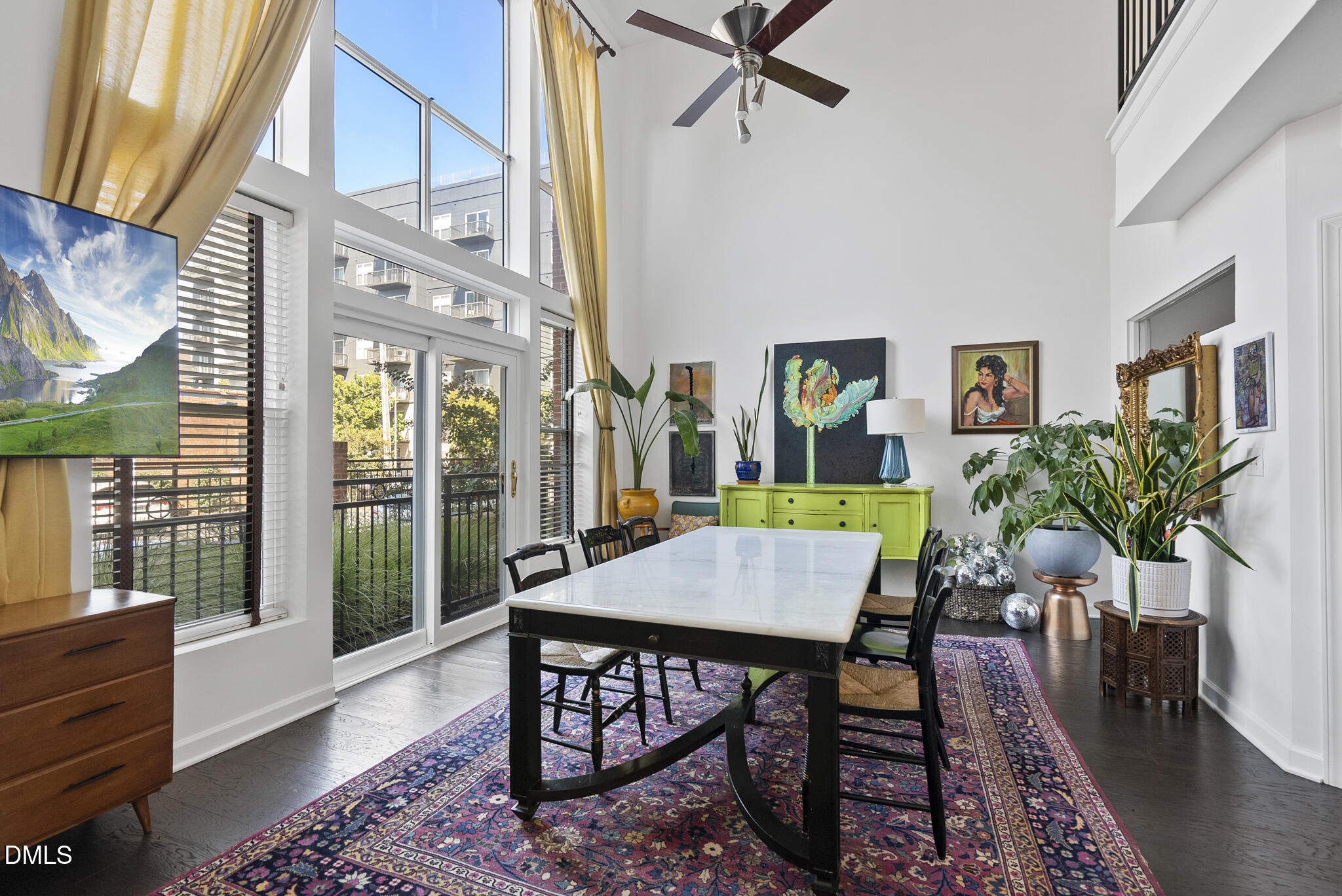200 South Dawson Street, Unit 111 Raleigh, NC 27601 - Photo 2 of 34 a view of a dining room with furniture window and wooden floor