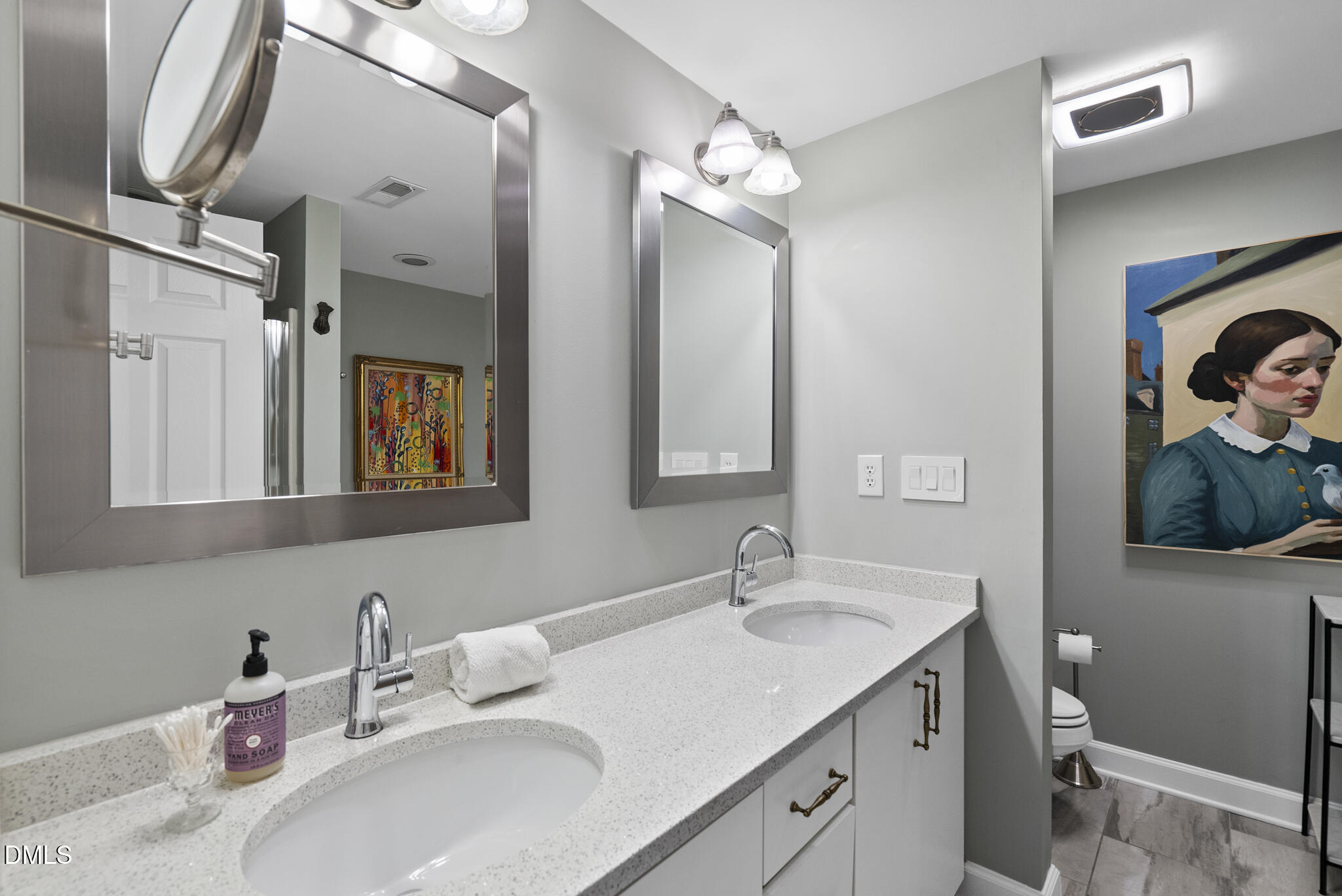 200 South Dawson Street, Unit 111 Raleigh, NC 27601 - Photo 24 of 34 a bathroom with a sink and a mirror