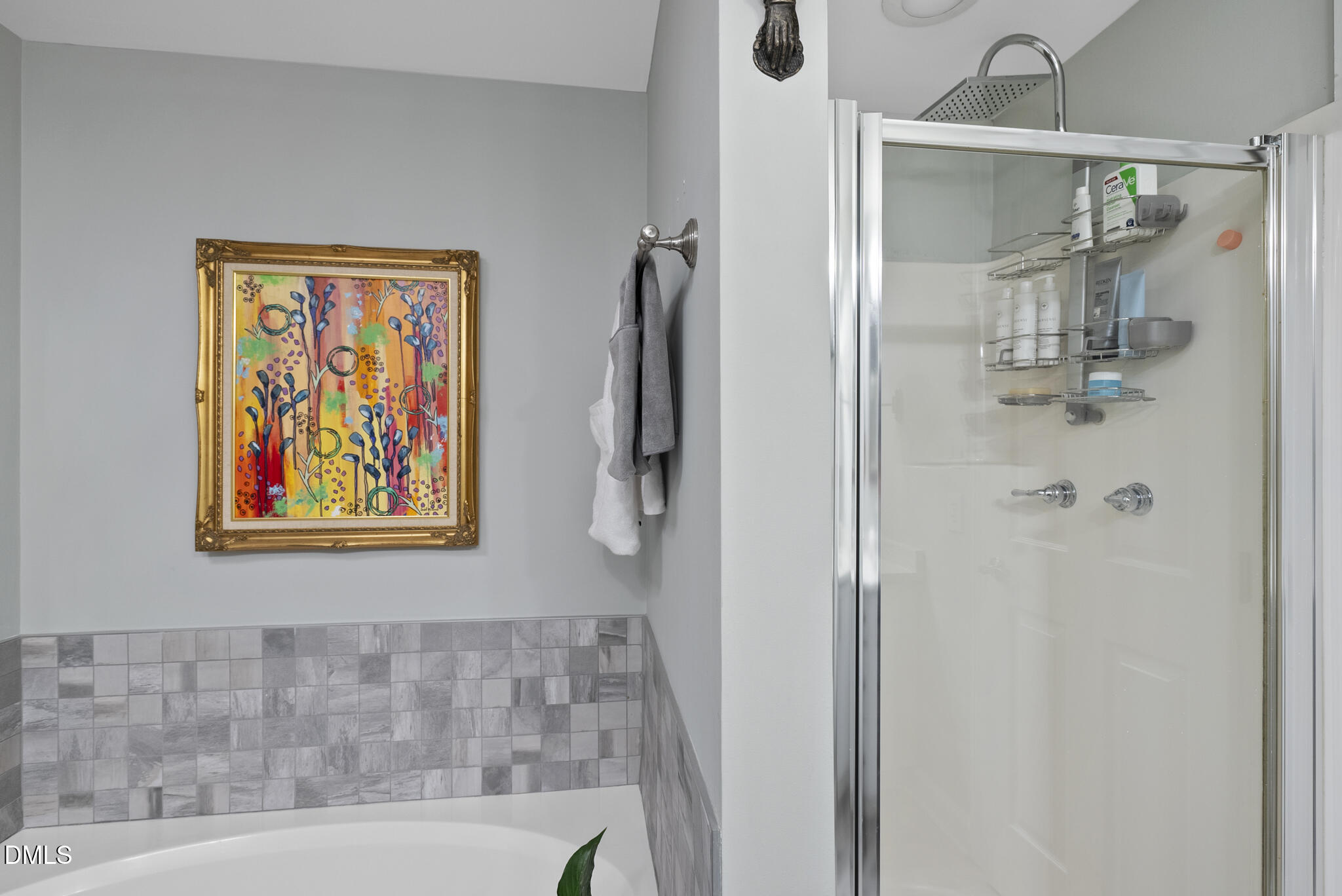 200 South Dawson Street, Unit 111 Raleigh, NC 27601 - Photo 25 of 34 a bathroom with a glass shower door