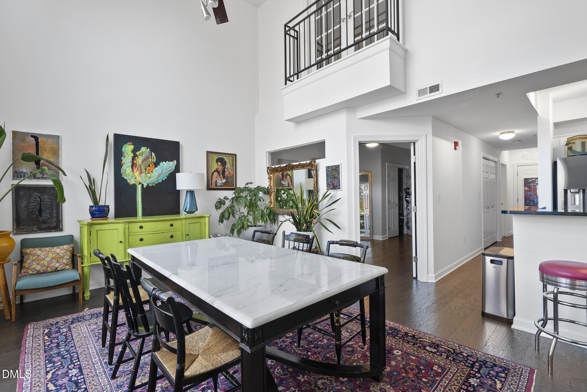 200 South Dawson Street, Unit 111 Raleigh, NC 27601 - Photo 3 of 34 a view of a dining room with furniture and wooden floor