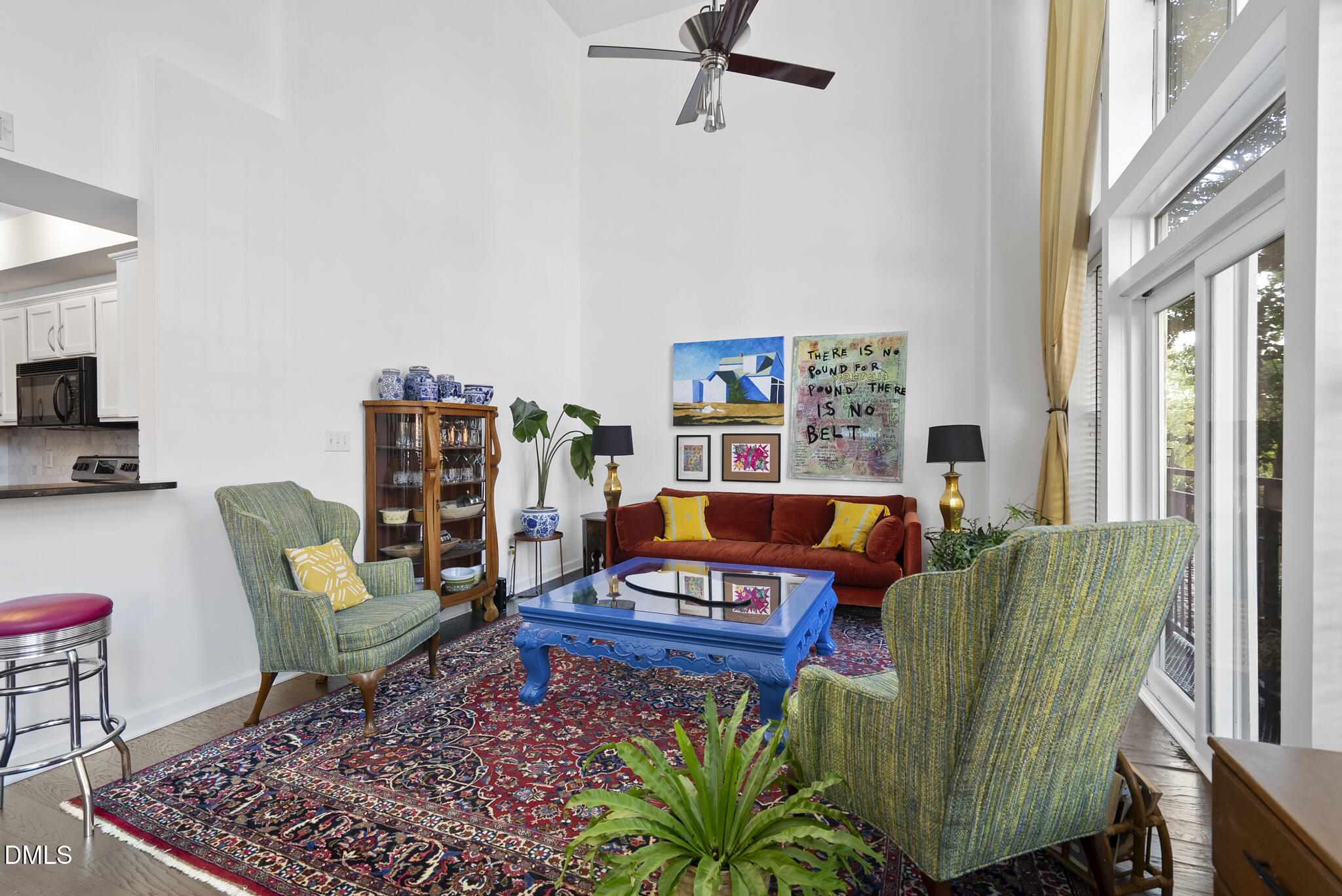 200 South Dawson Street, Unit 111 Raleigh, NC 27601 - Photo 5 of 34 a living room with furniture a rug and a window