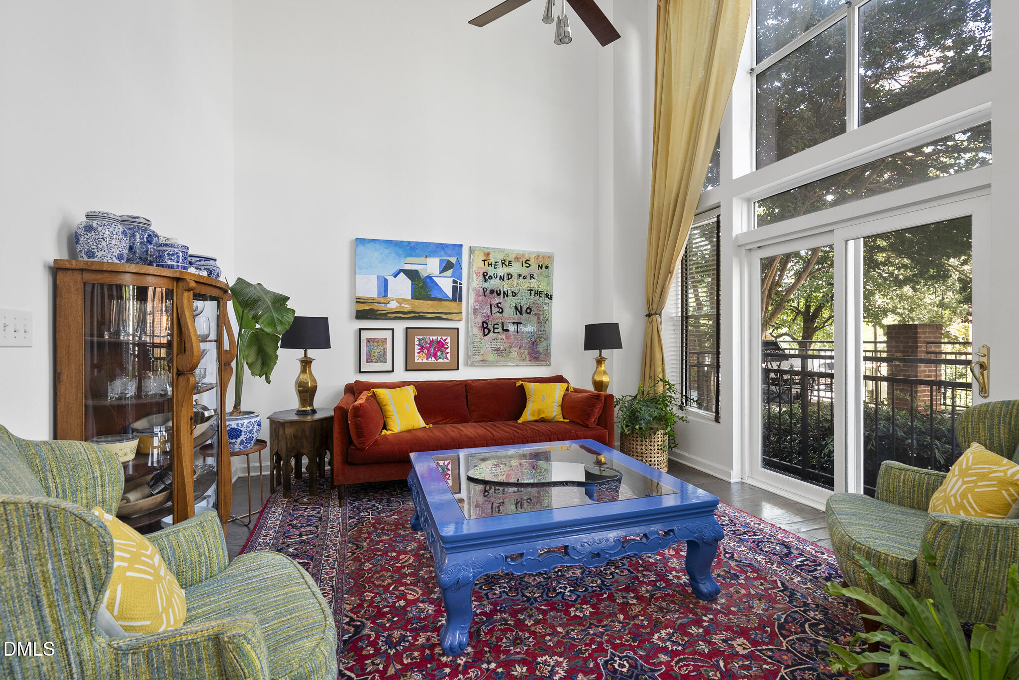 200 South Dawson Street, Unit 111 Raleigh, NC 27601 - Photo 6 of 34 a living room with furniture fireplace and a large window