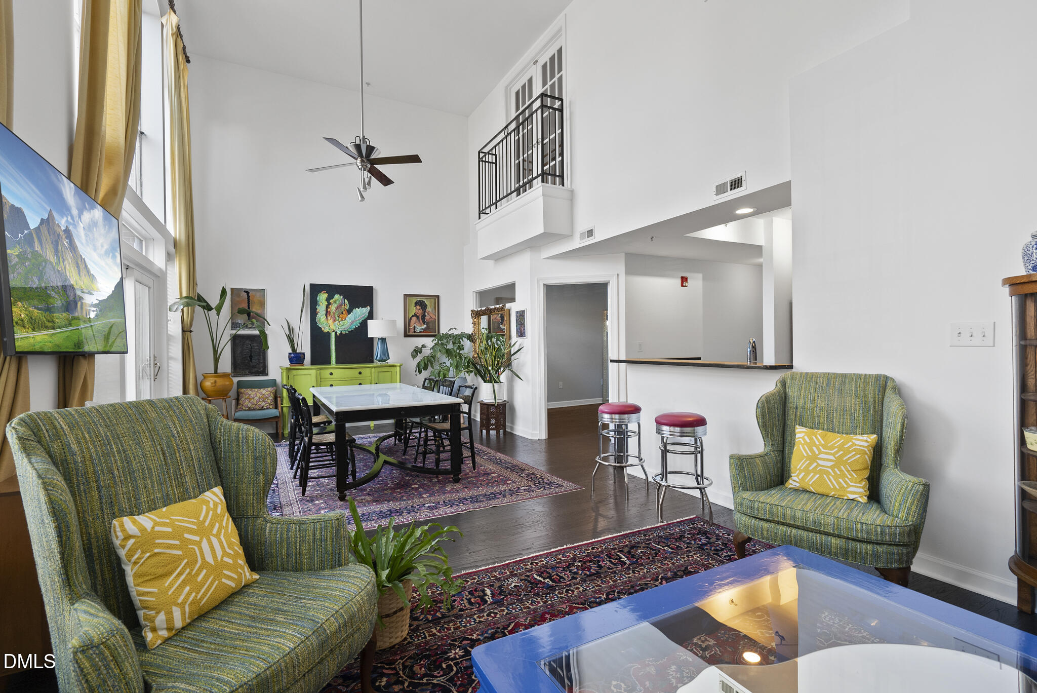 200 South Dawson Street, Unit 111 Raleigh, NC 27601 - Photo 8 of 34 a living room with furniture and a rug