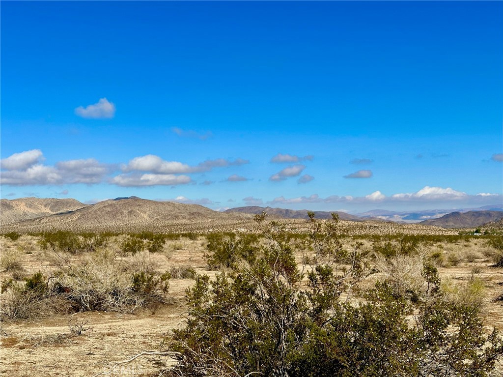 0 Jemez Trail Landers, CA 92285 - Photo 5 of 12 a view of a city with mountains in the background