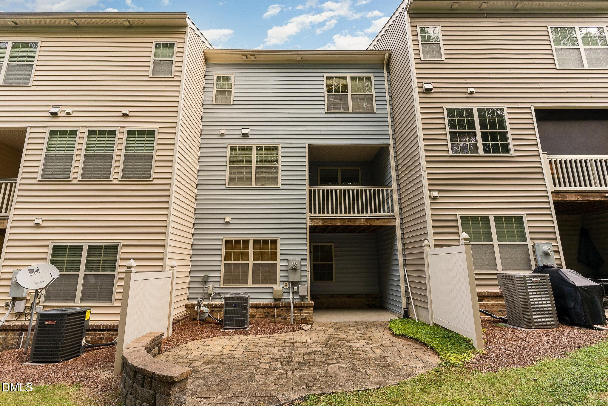 8120 Primanti Boulevard Raleigh, NC 27612 - Photo 4 of 5 a view of a house with a yard and furniture