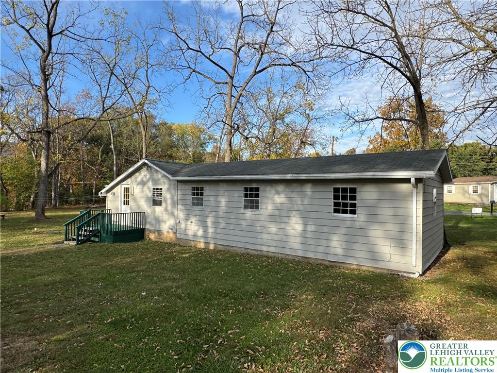 1071 Bitternut Road Walnutport, PA 18088 - Photo 16 of 39 a front view of a house with a yard