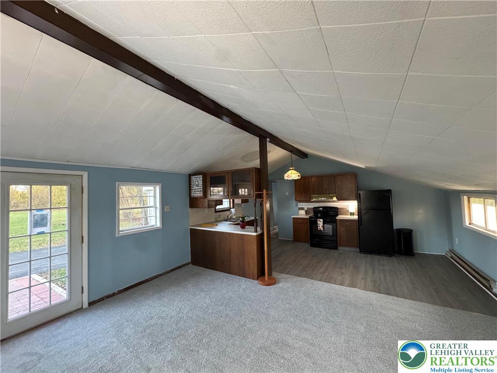 1071 Bitternut Road Walnutport, PA 18088 - Photo 2 of 39 a view of a livingroom with furniture and windows