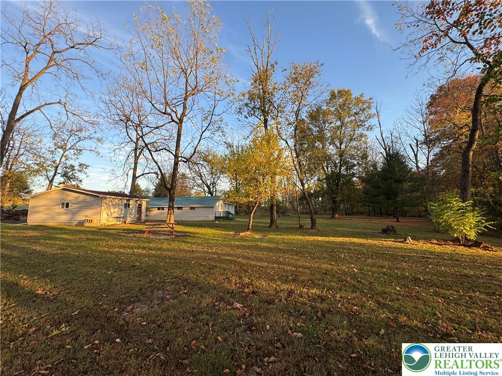 1071 Bitternut Road Walnutport, PA 18088 - Photo 21 of 39 a view of a field of grass and trees