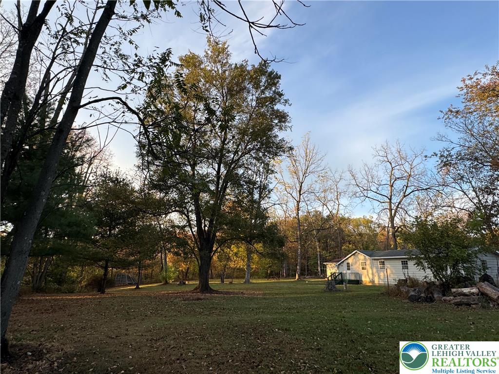 1071 Bitternut Road Walnutport, PA 18088 - Photo 24 of 39 a view of grassy field with benches