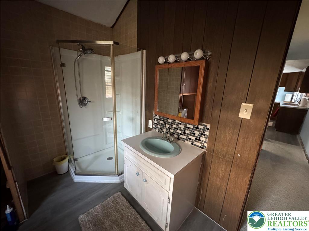 1071 Bitternut Road Walnutport, PA 18088 - Photo 28 of 39 a bathroom with a sink vanity granite tub and shower