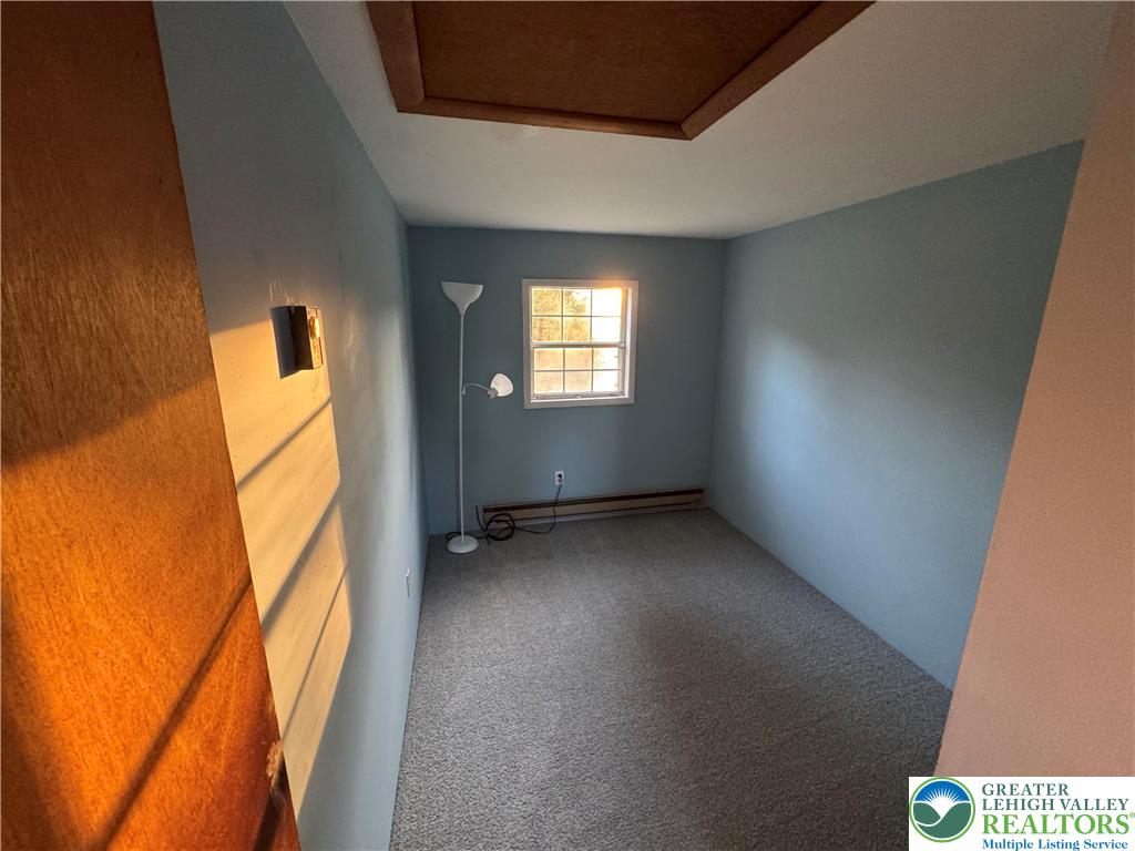 1071 Bitternut Road Walnutport, PA 18088 - Photo 33 of 39 an empty room with windows