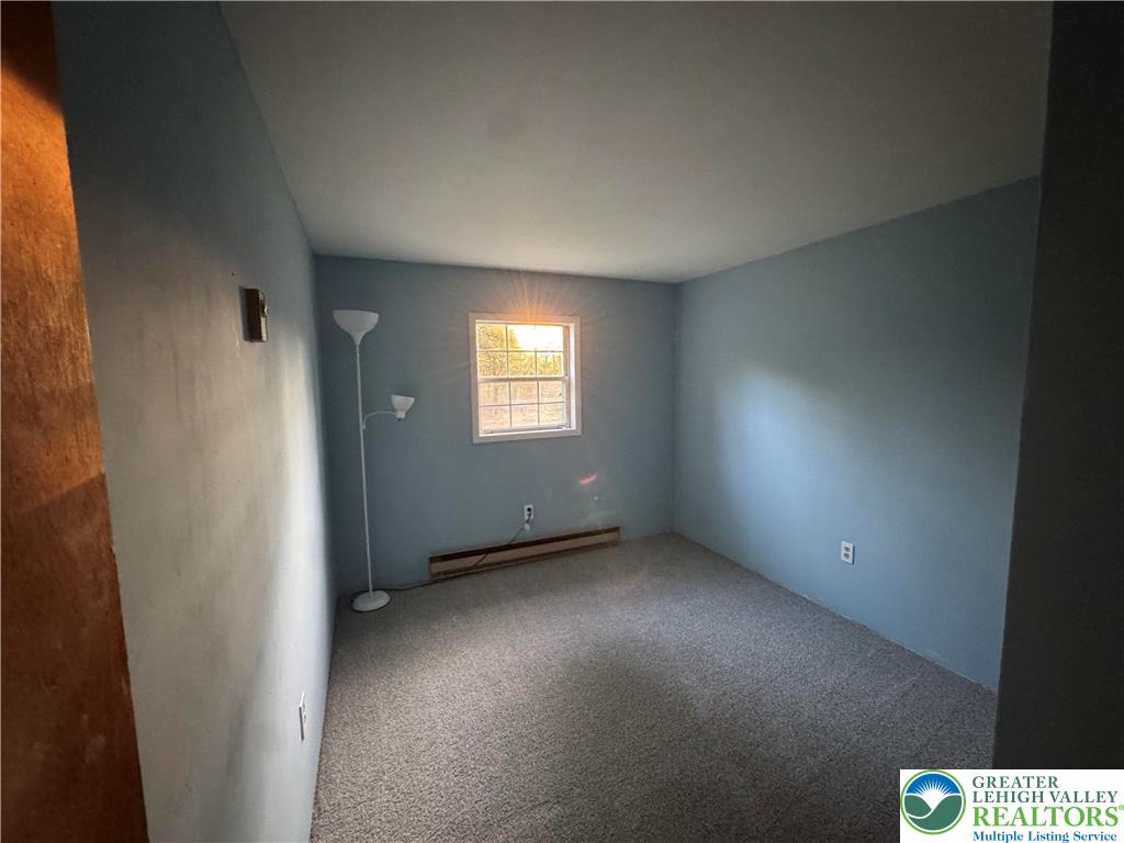 1071 Bitternut Road Walnutport, PA 18088 - Photo 34 of 39 a view of an empty room with a window