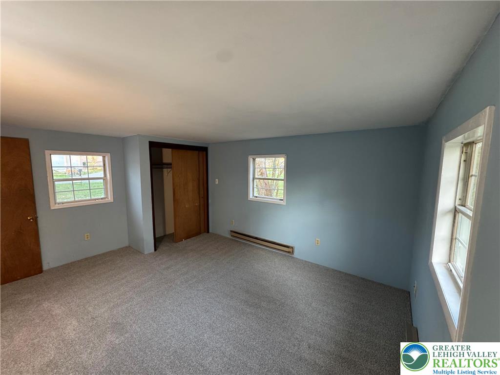 1071 Bitternut Road Walnutport, PA 18088 - Photo 36 of 39 an empty room with windows