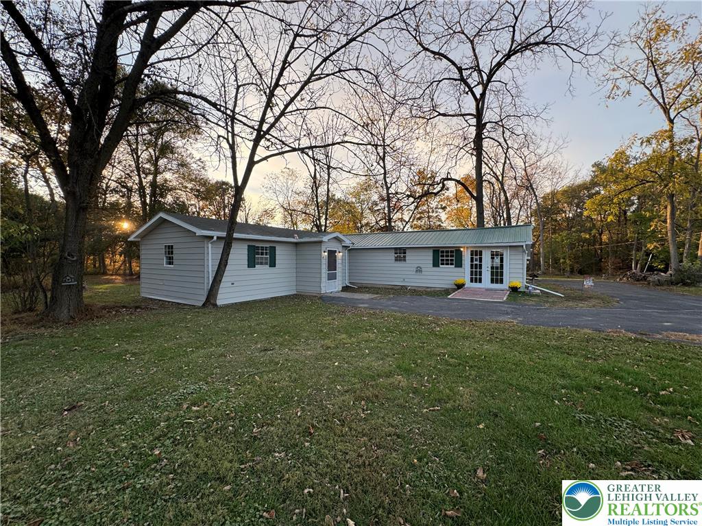 1071 Bitternut Road Walnutport, PA 18088 - Photo 7 of 39 a view of a house with a back yard