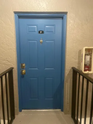 a view of a kitchen with a sink