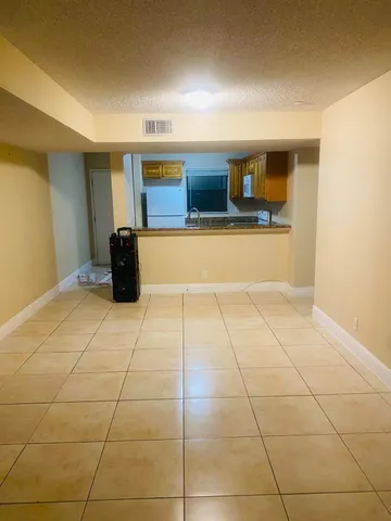 a view of front door with wooden floor