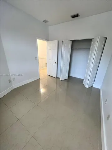 a view of a backyard with a street view