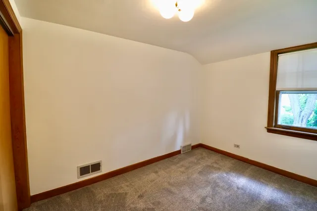 a view of a room that has a window in it