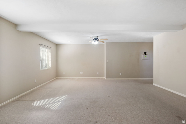 1417 Blacksmith Lane Draper, UT 84020 - Photo 27 of 57 Spacious room featuring neutral carpeting, a ceiling fan with light, and a window with horizontal blinds