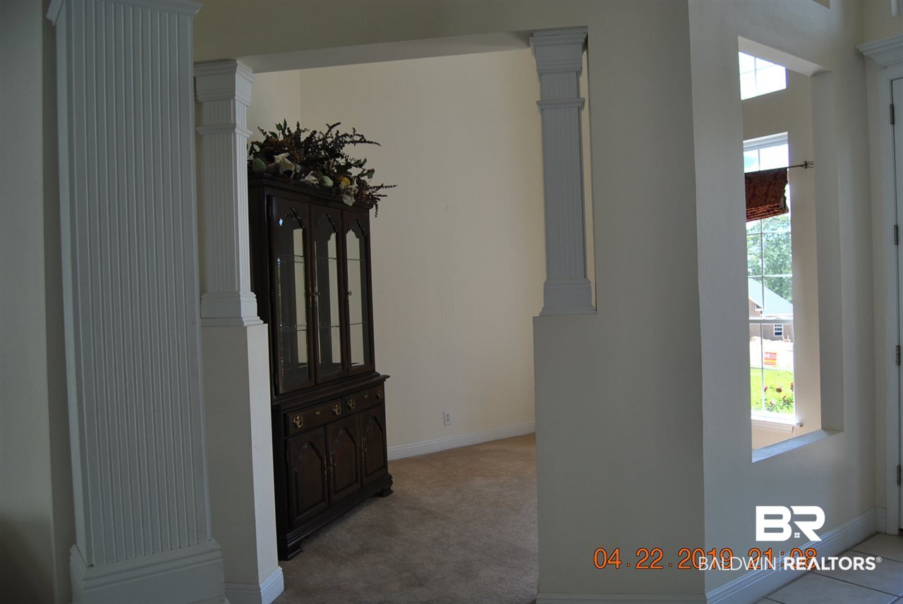 411 Juniper Creek Road Brewton, AL 36426 - Photo 16 of 35 View showing dining room with openings in walls