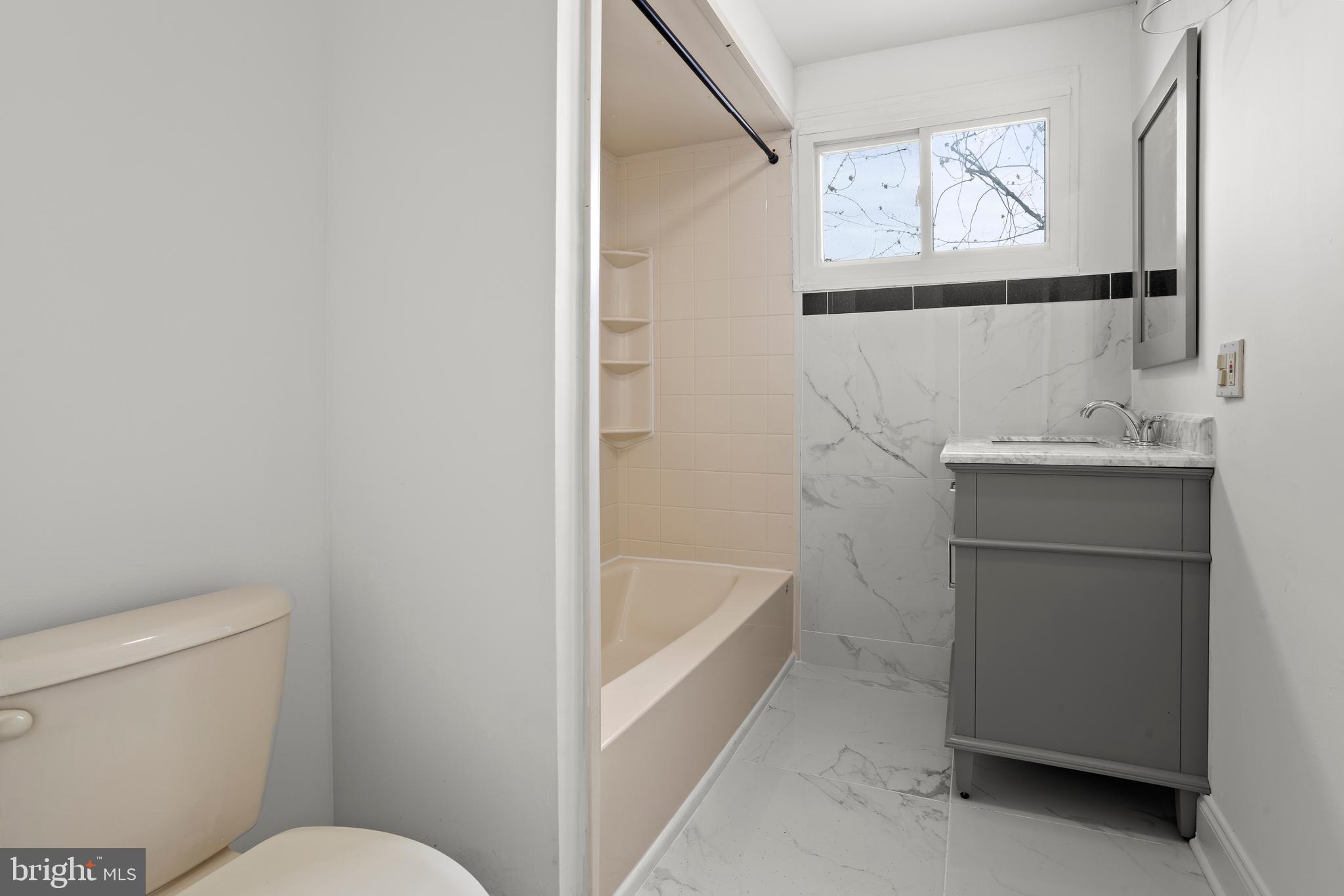 1900 Fowler Road Folcroft, PA 19032 - Photo 18 of 24 a bathroom with a sink toilet and vanity