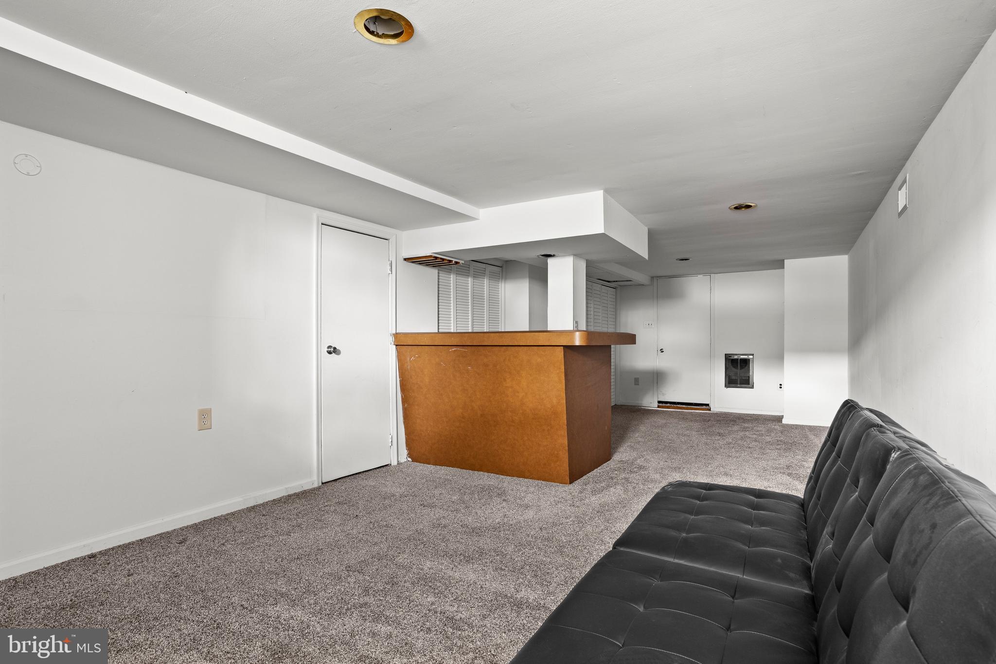 1900 Fowler Road Folcroft, PA 19032 - Photo 20 of 24 a view of a livingroom with a & sink cabinets and a floor to ceiling window