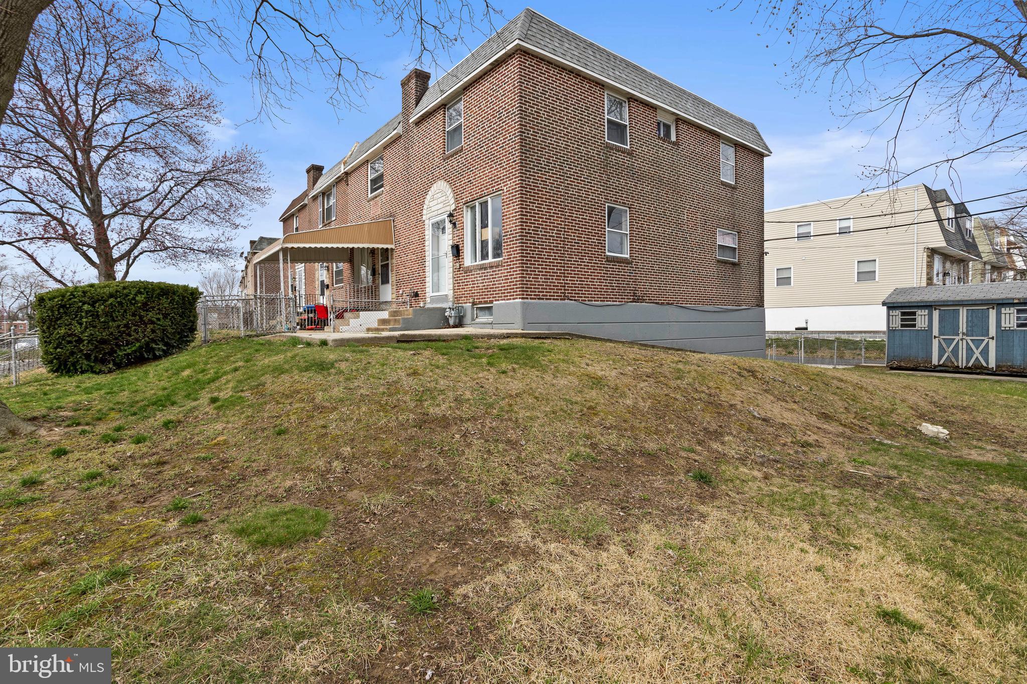 1900 Fowler Road Folcroft, PA 19032 - Photo 2 of 24 a view of a house with backyard and garden