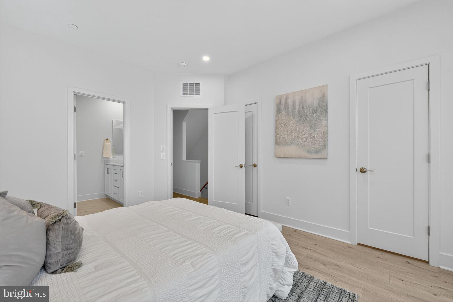 2009 Tysons Ridgeline Road Falls Church, VA 22043 - Photo 22 of 64 a bedroom with a bed and a mirror