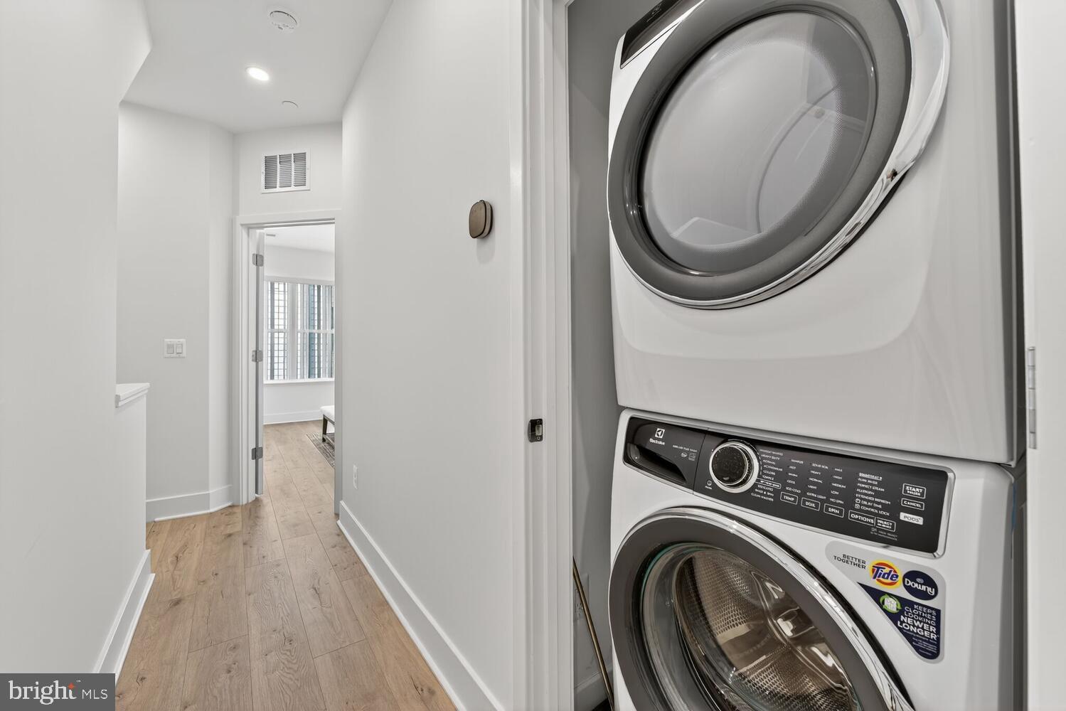 2009 Tysons Ridgeline Road Falls Church, VA 22043 - Photo 40 of 64 a view of a storage and utility room with washer and dryer