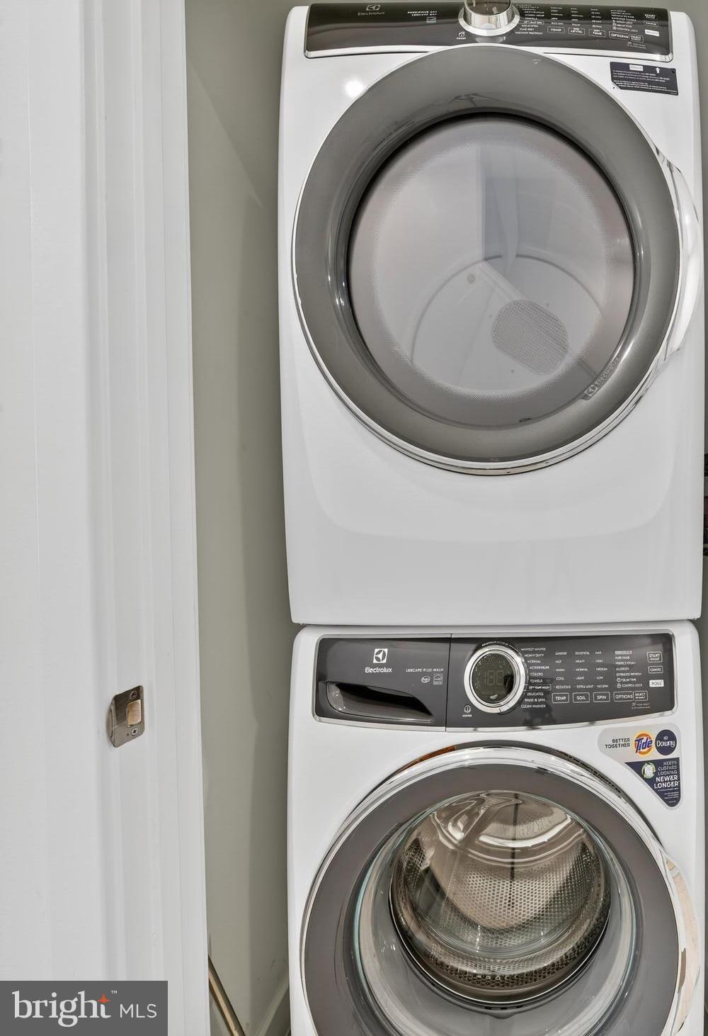 2009 Tysons Ridgeline Road Falls Church, VA 22043 - Photo 41 of 64 a utility room with washing machine