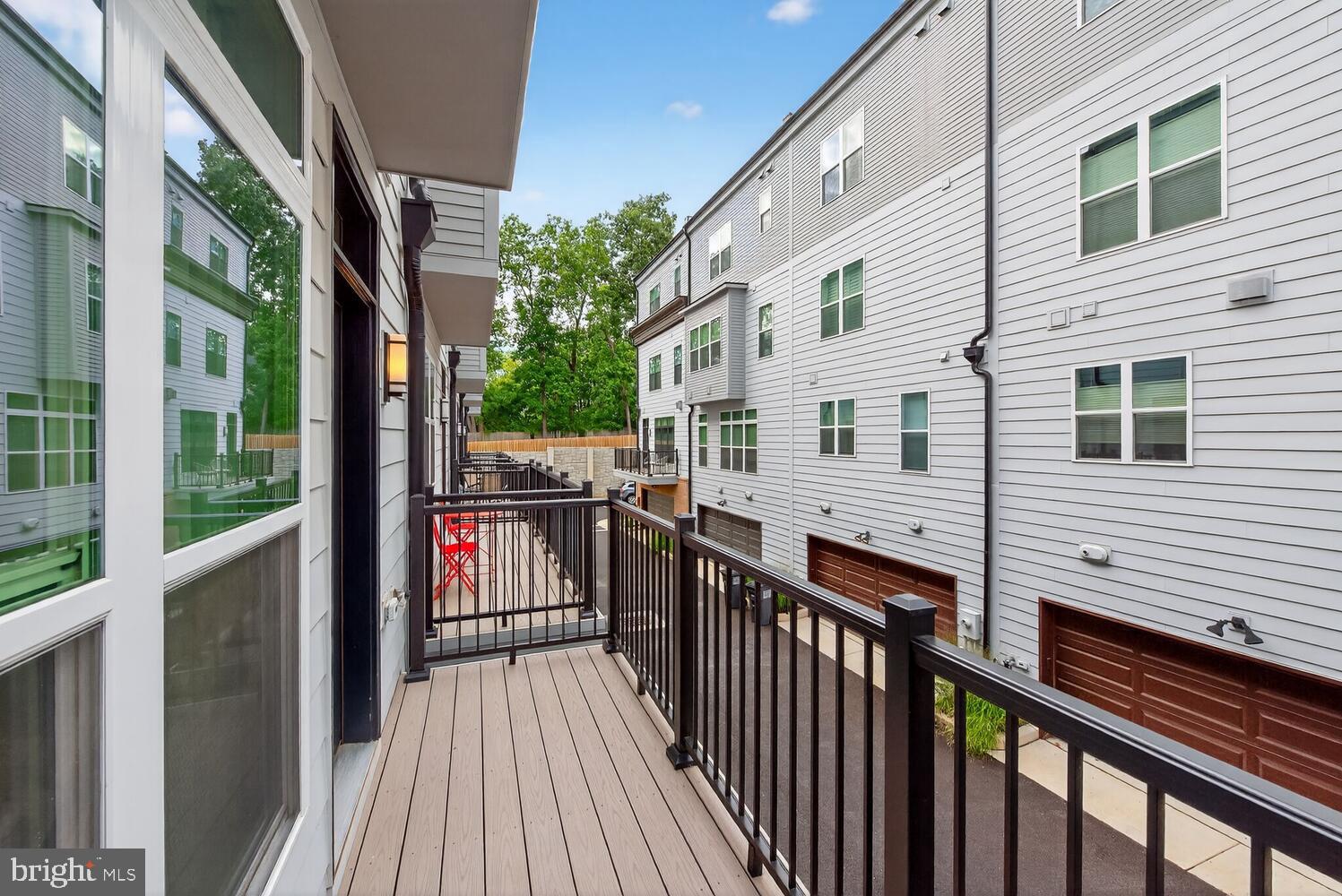 2009 Tysons Ridgeline Road Falls Church, VA 22043 - Photo 49 of 64 a view of a house with a deck
