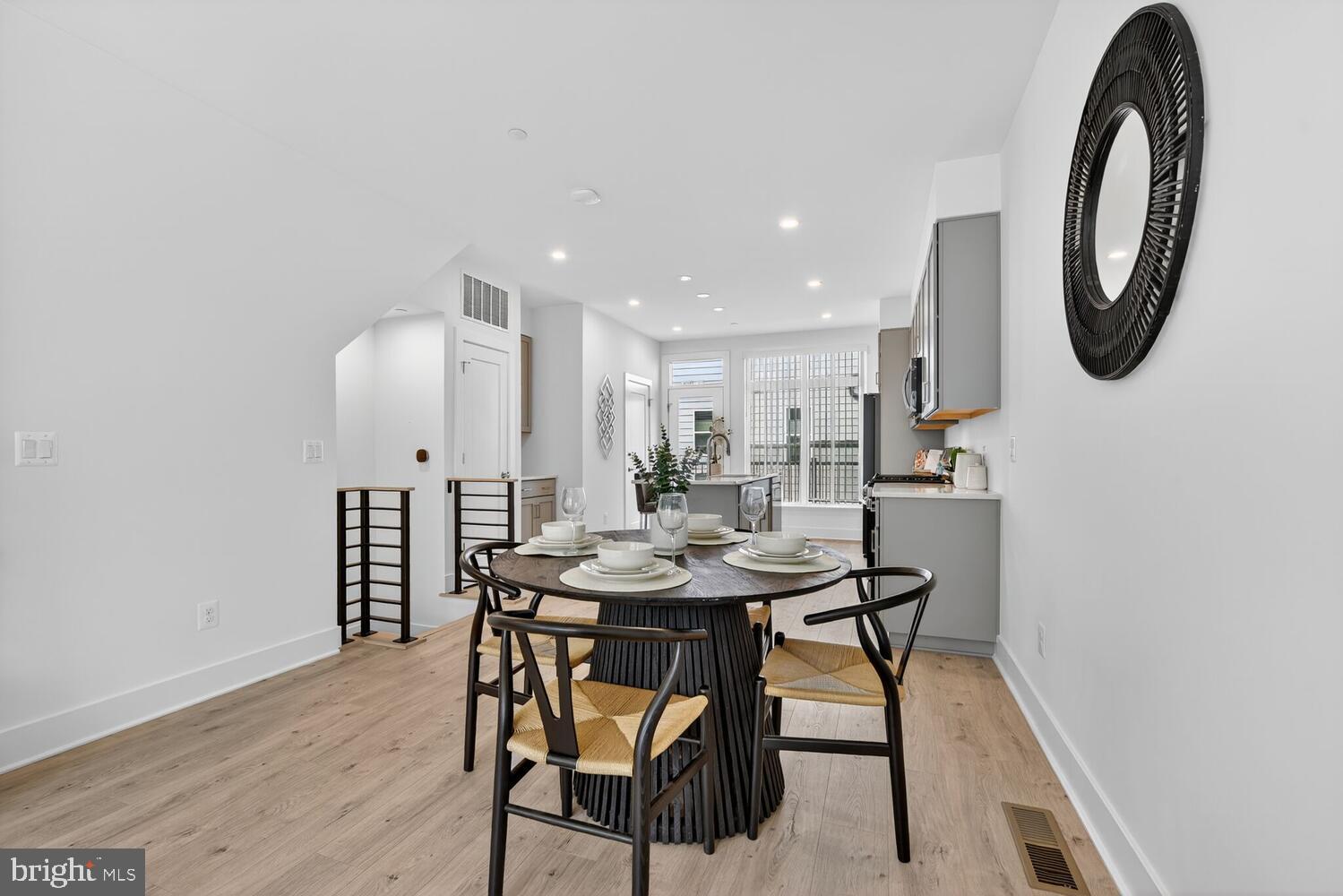2009 Tysons Ridgeline Road Falls Church, VA 22043 - Photo 10 of 64 a view of a dining room with furniture and a mirror