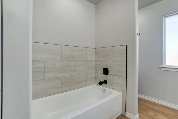 a bathroom with a bathtub