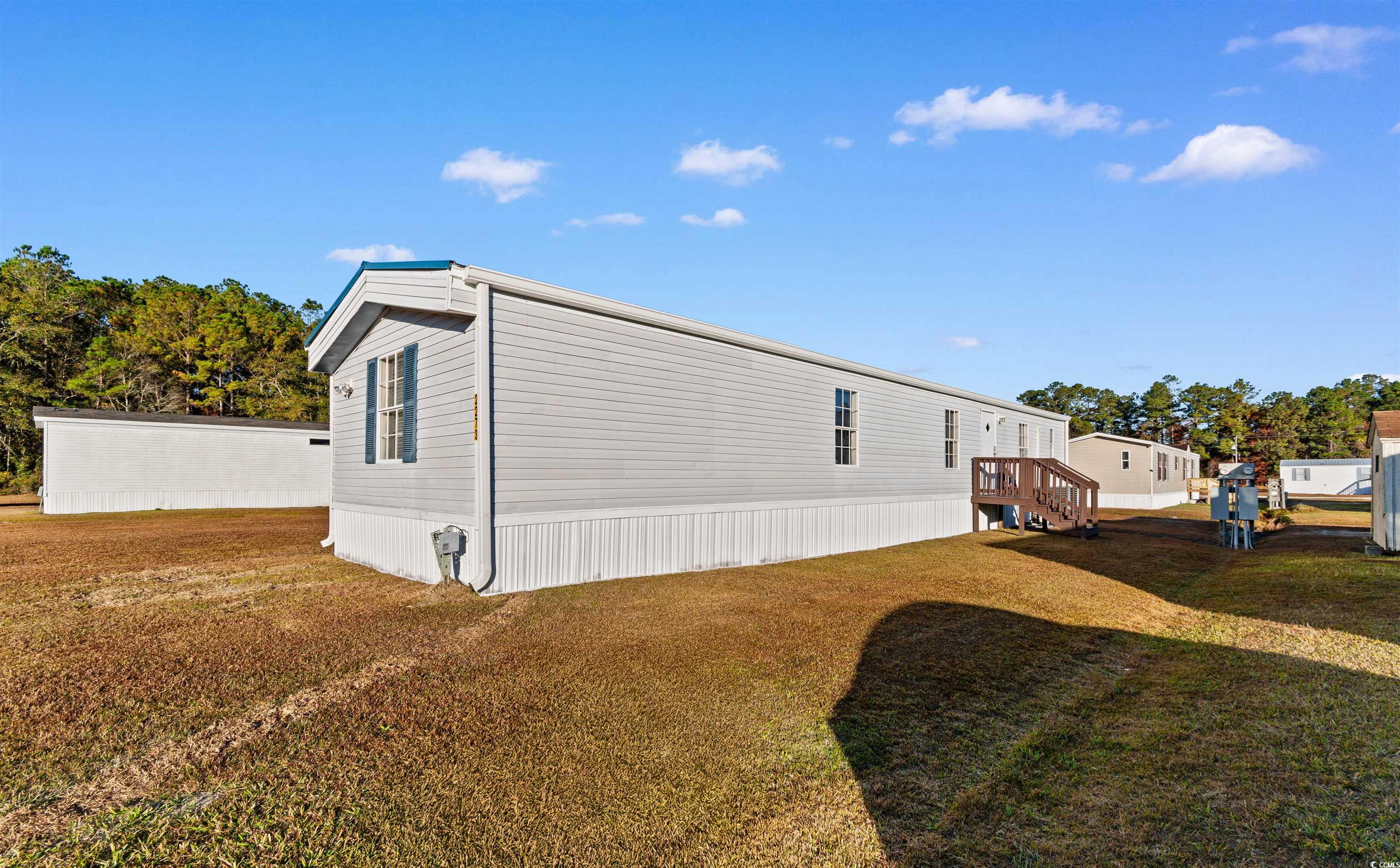 2273 Python Circle Conway, SC 29526 - Photo 27 of 38 View of home's exterior with a yard