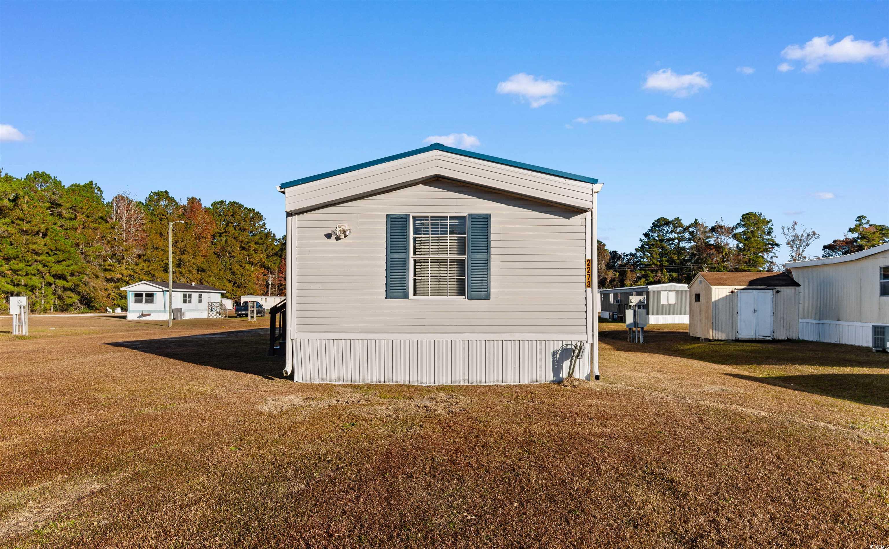 2273 Python Circle Conway, SC 29526 - Photo 28 of 38 View of property exterior with a yard
