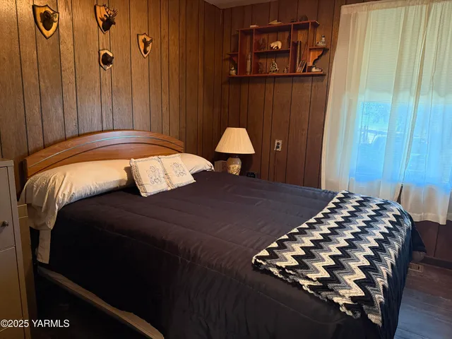 a balcony view with a sink and a window