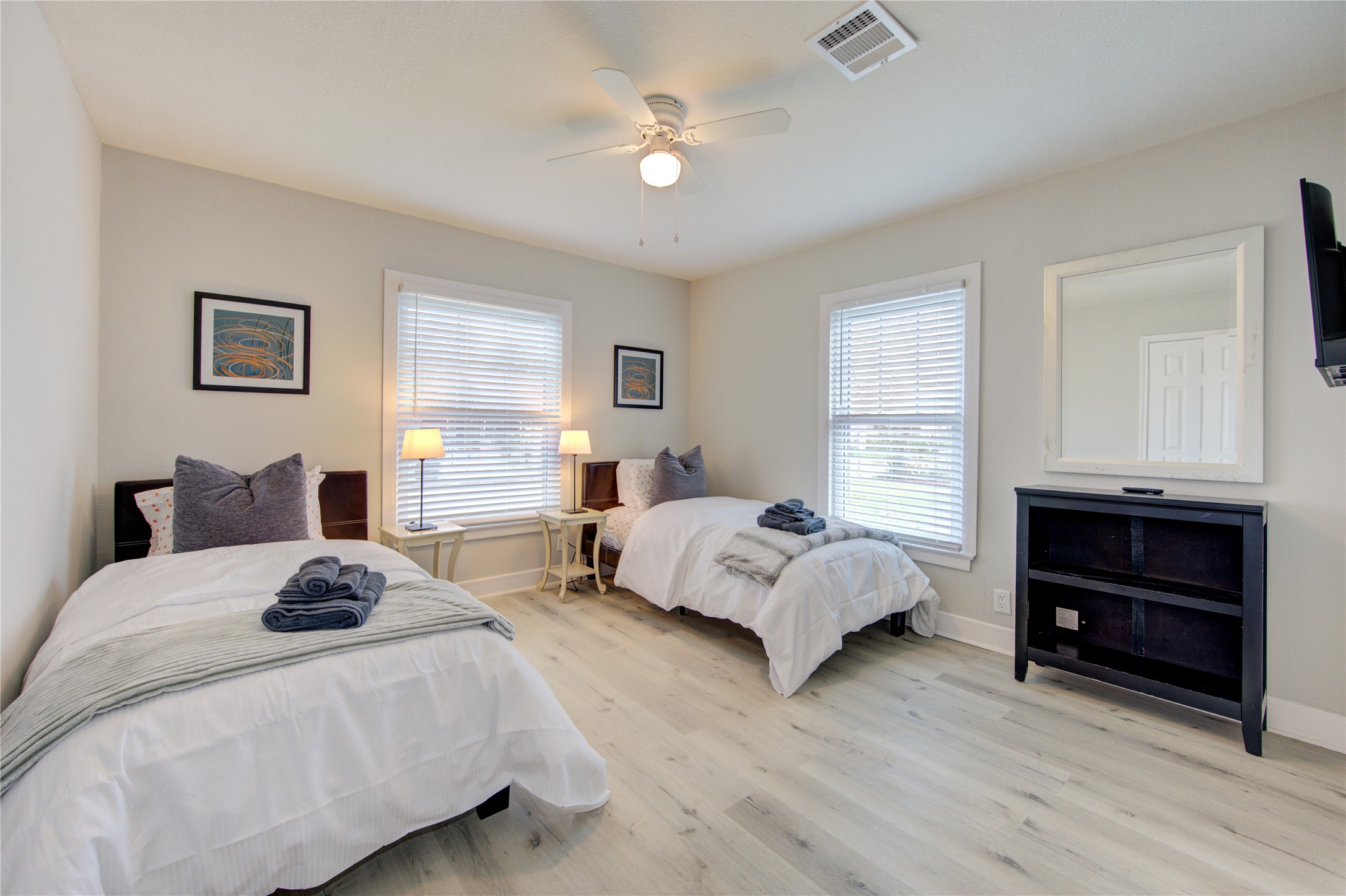 4522 Dixie Drive Houston, TX 77021 - Photo 21 of 33 a bedroom with a bed and a chandelier