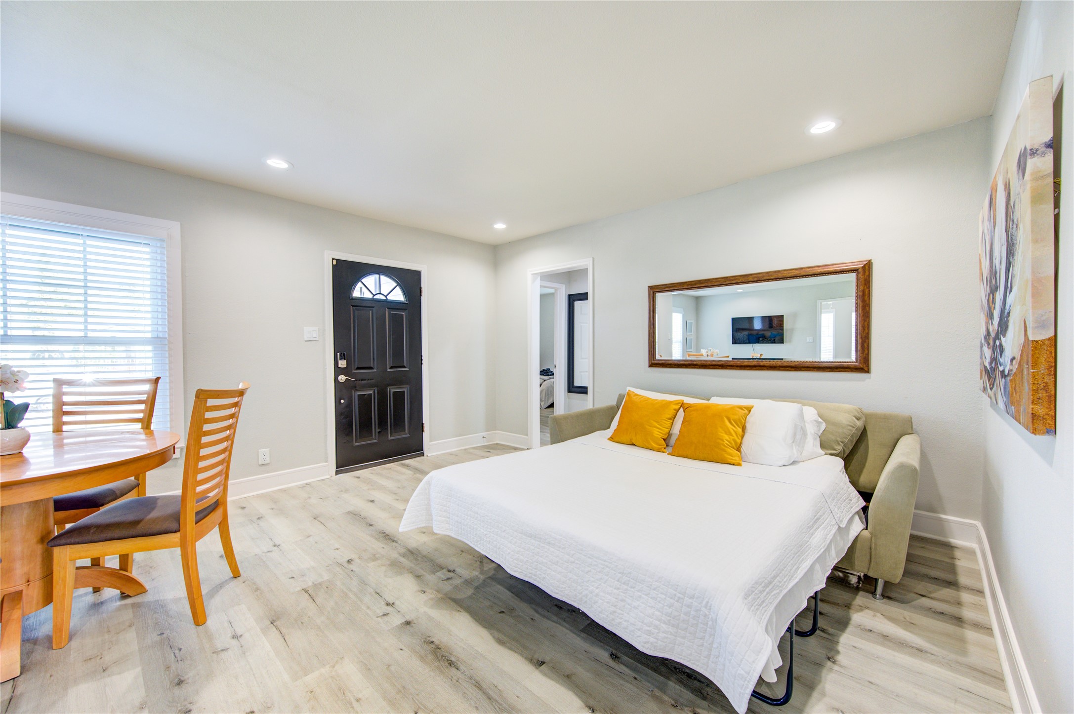 4522 Dixie Drive Houston, TX 77021 - Photo 3 of 33 a bedroom with a bed and a table