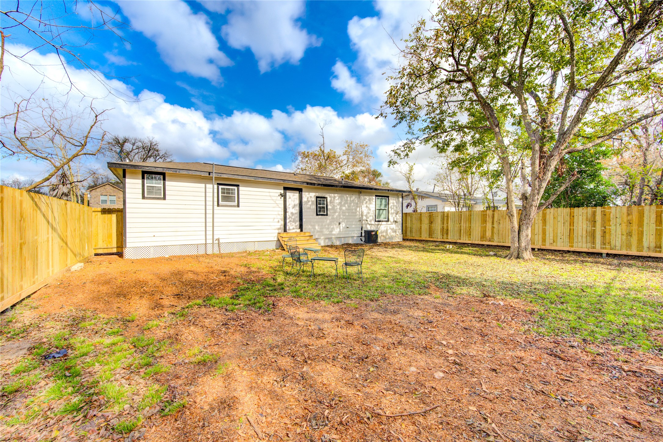 4522 Dixie Drive Houston, TX 77021 - Photo 32 of 33 a view of a house with a large tree and a yard