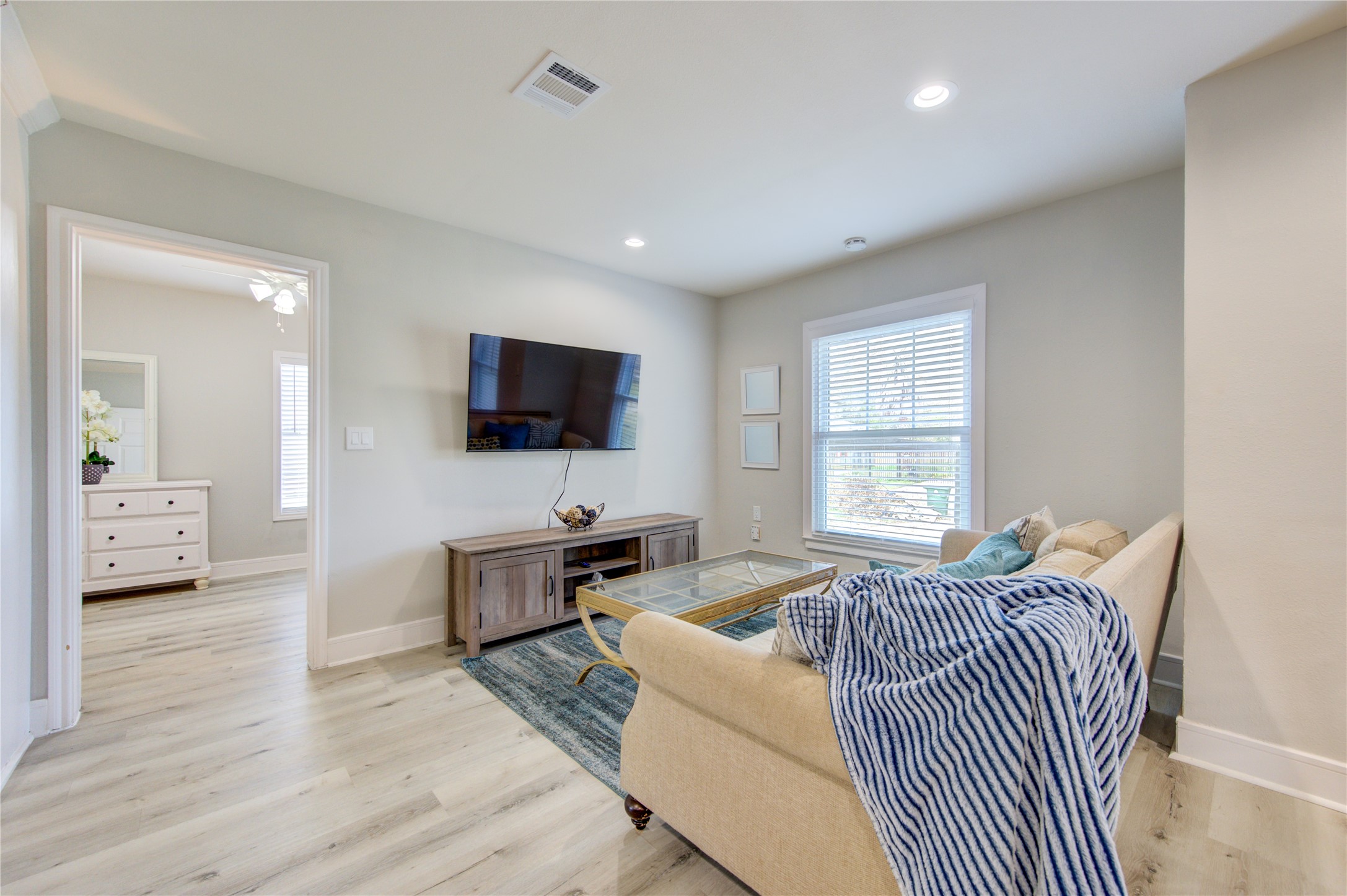 4522 Dixie Drive Houston, TX 77021 - Photo 4 of 33 a living room with furniture and a flat screen tv